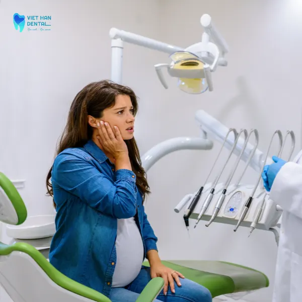 Mẹ bầu có nhổ răng khôn được không?